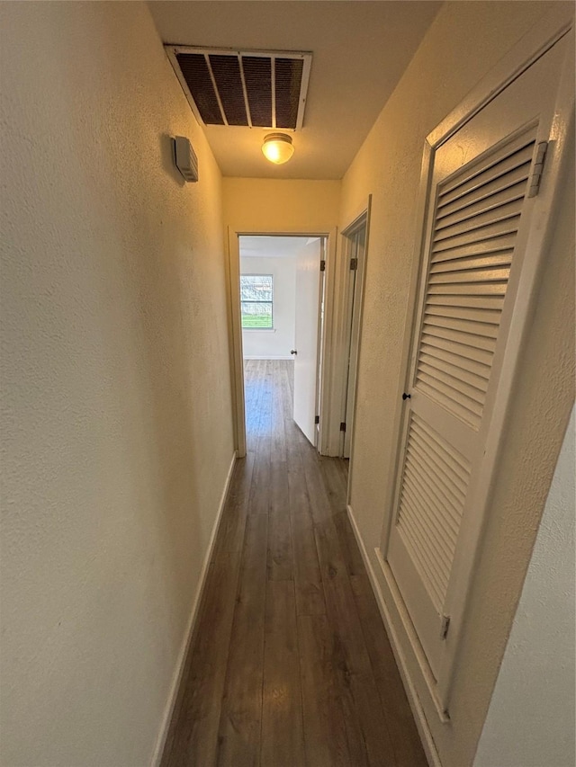 hall featuring dark hardwood / wood-style floors