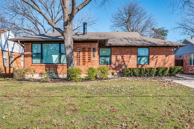 ranch-style home with a front yard