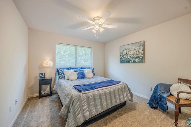 bedroom with ceiling fan and carpet flooring