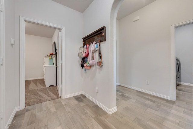 hallway featuring washer / dryer