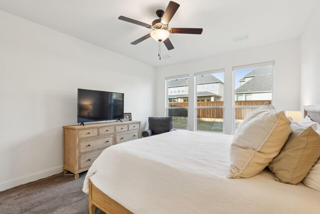 bedroom featuring ceiling fan and carpet flooring