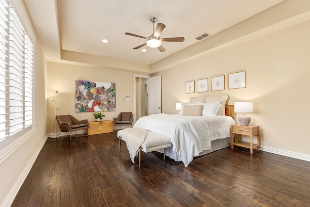 bedroom with dark wood-type flooring and ceiling fan