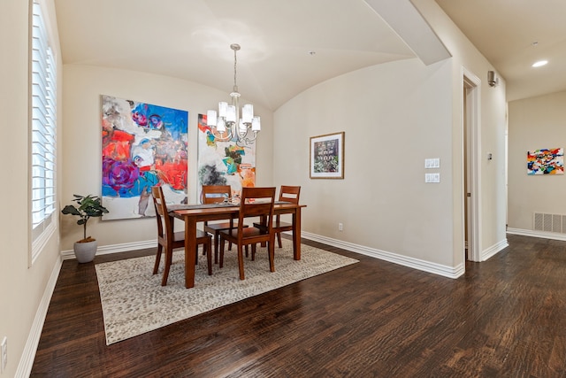 dining area with dark wood-type flooring, brick ceiling, vaulted ceiling, and a chandelier