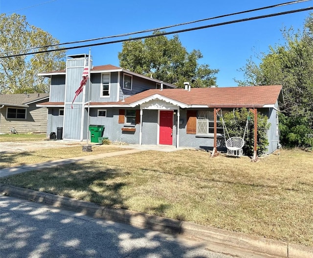 view of front of home featuring a front yard