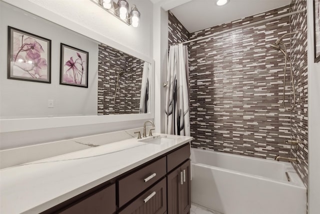 bathroom with shower / bath combination with curtain and vanity