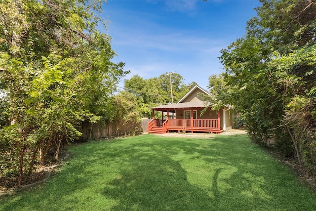 view of yard featuring a deck