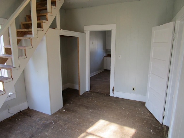 empty room with dark hardwood / wood-style floors