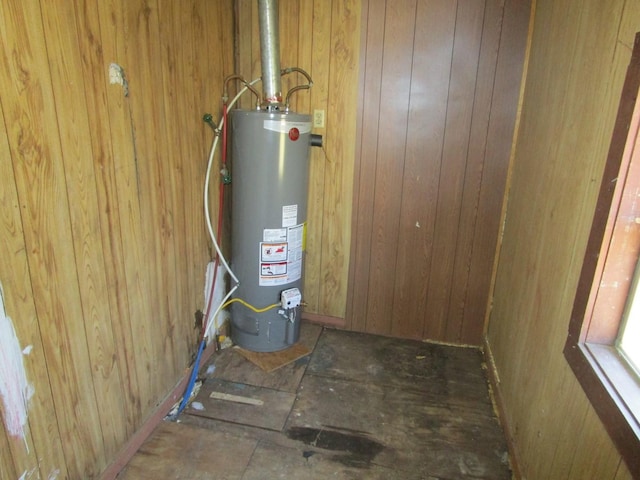 utility room with water heater