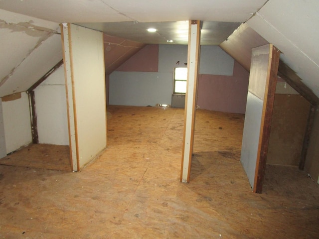 bonus room featuring vaulted ceiling