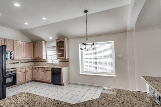 kitchen with lofted ceiling, light tile patterned floors, pendant lighting, backsplash, and black appliances