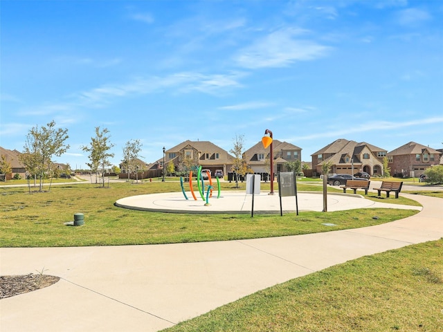 view of play area featuring a lawn