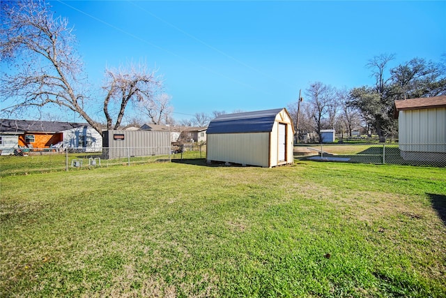 view of yard with a storage unit