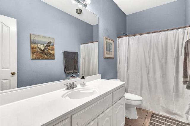 full bathroom with vanity, toilet, shower / bath combo with shower curtain, and tile patterned flooring