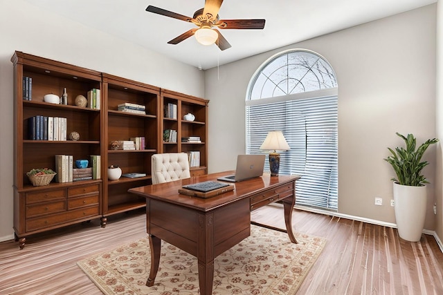 home office featuring ceiling fan and light wood-type flooring