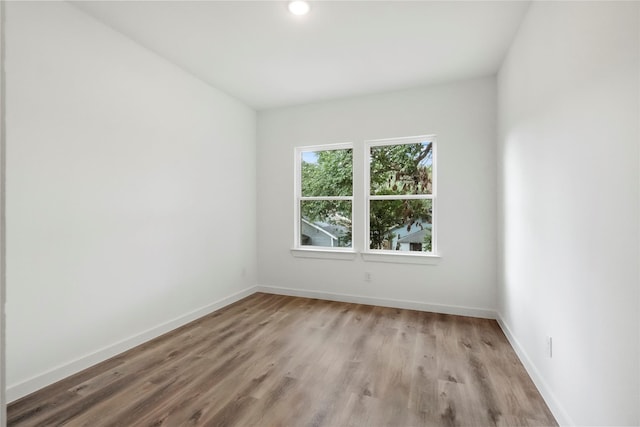 spare room with light wood-type flooring