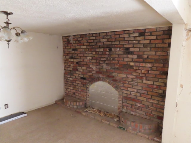 unfurnished living room with a textured ceiling