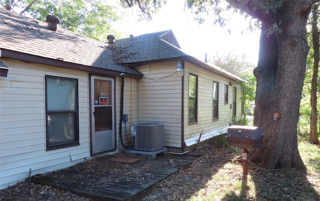 exterior space featuring central air condition unit