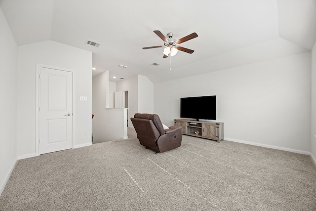 living area with light carpet, lofted ceiling, and ceiling fan