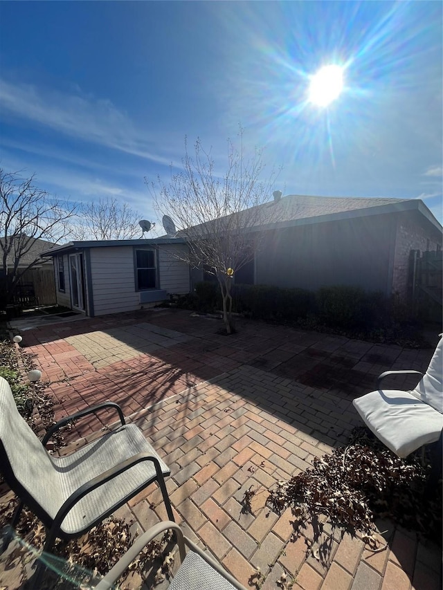 back of house featuring a patio area