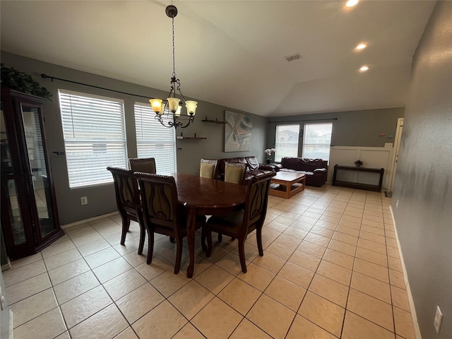 dining area featuring light tile patterned floors, visible vents, an inviting chandelier, vaulted ceiling, and recessed lighting