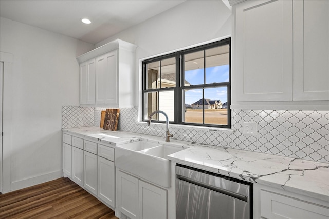 kitchen featuring sink, stainless steel dishwasher, dark hardwood / wood-style floors, and white cabinetry