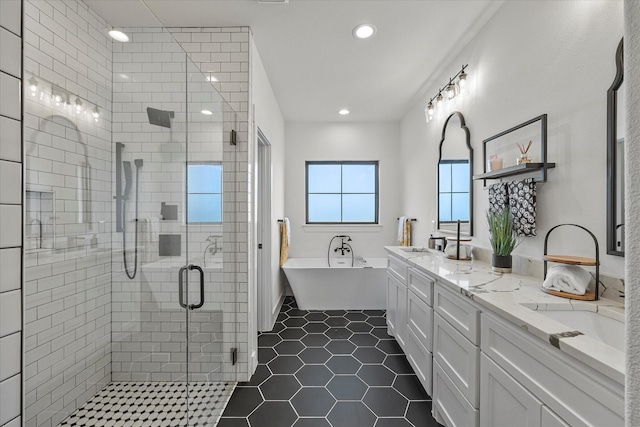 bathroom featuring vanity, tile patterned floors, and independent shower and bath