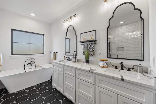 bathroom with vanity, tile patterned flooring, and independent shower and bath