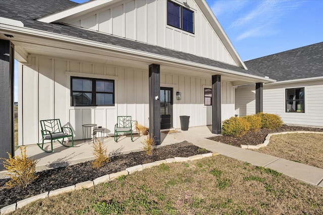 property entrance with covered porch