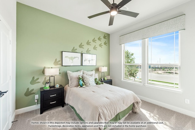 carpeted bedroom with ceiling fan