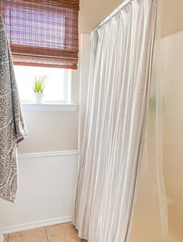 bathroom with tile patterned flooring