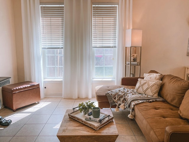 living room with light tile patterned floors and a wealth of natural light