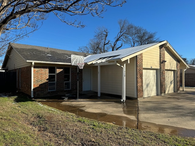 exterior space with a garage