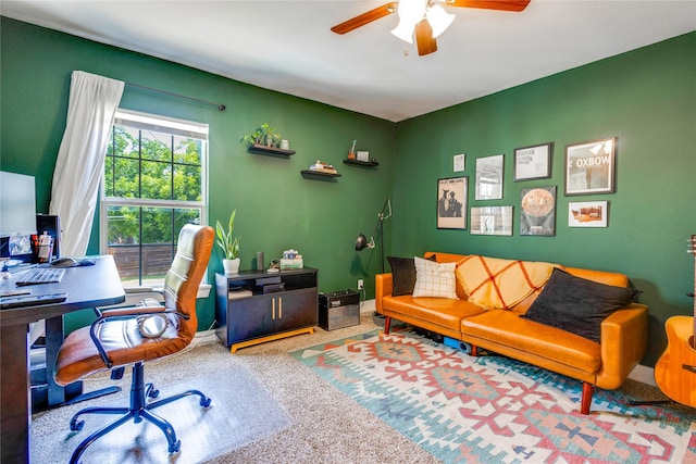 home office with ceiling fan and carpet floors