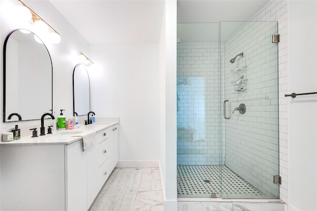 bathroom featuring walk in shower and vanity