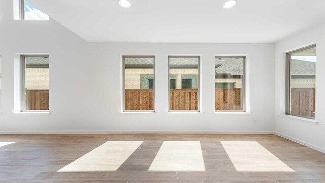 9328 Paintbrush Dr, Oak Point, TX 75068 - spare room with recessed lighting, baseboards, and light wood-style floors