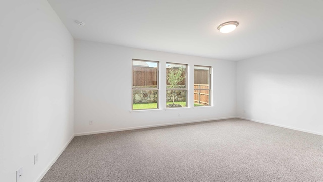 9328 Paintbrush Dr, Oak Point, TX 75068 - spare room featuring carpet floors and baseboards