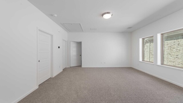 9328 Paintbrush Dr, Oak Point, TX 75068 - unfurnished bedroom with attic access, carpet, and baseboards