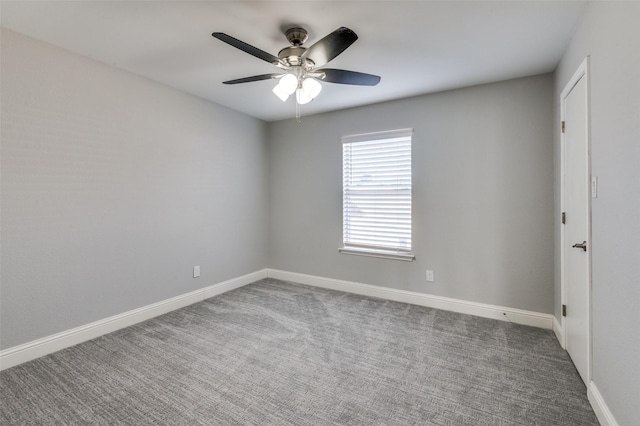 empty room featuring ceiling fan and carpet floors