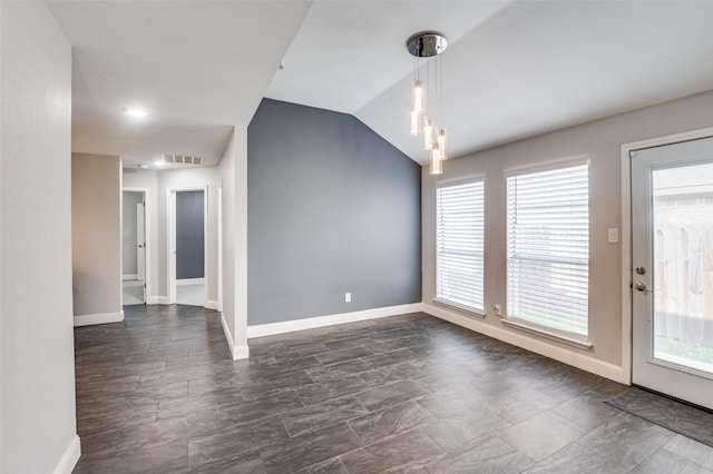 unfurnished dining area featuring lofted ceiling