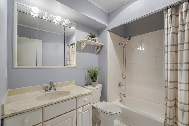 bathroom with shower / tub combo, vanity, and toilet