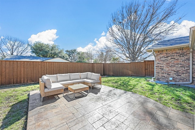 view of patio with a fenced backyard and an outdoor living space