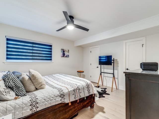 bedroom featuring ceiling fan and light wood-type flooring