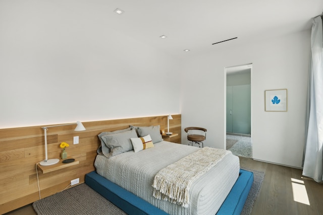 bedroom featuring dark wood-type flooring