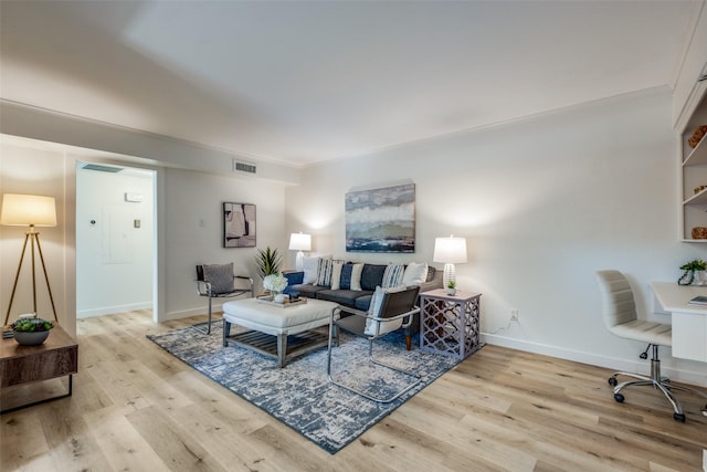 living room with light hardwood / wood-style floors