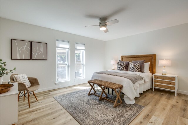 bedroom featuring ceiling fan and light hardwood / wood-style floors