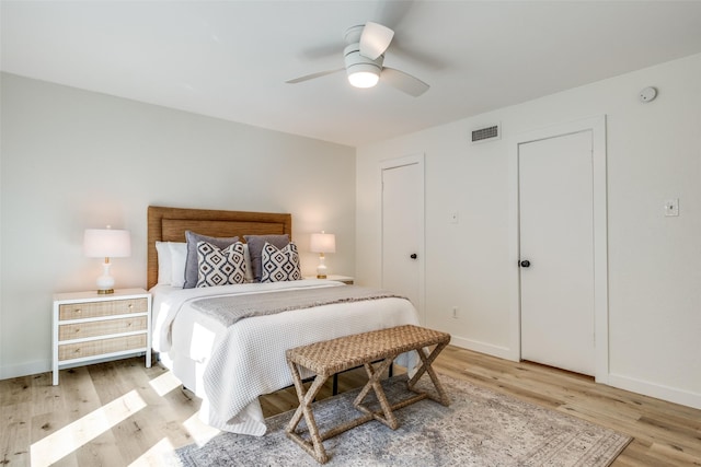 bedroom featuring ceiling fan and light wood-type flooring