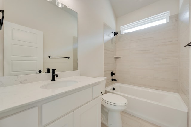 full bathroom with toilet, tiled shower / bath combo, tile patterned floors, and vanity