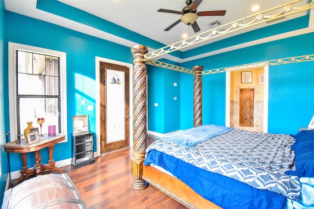 bedroom featuring ceiling fan and hardwood / wood-style flooring