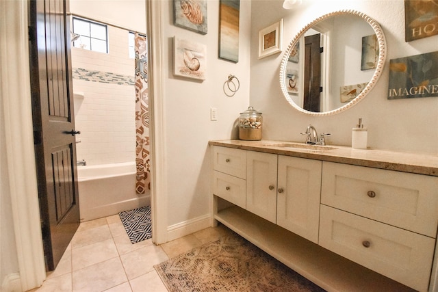 bathroom with vanity, tile patterned flooring, and shower / bath combo