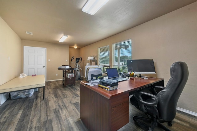 office with dark hardwood / wood-style floors